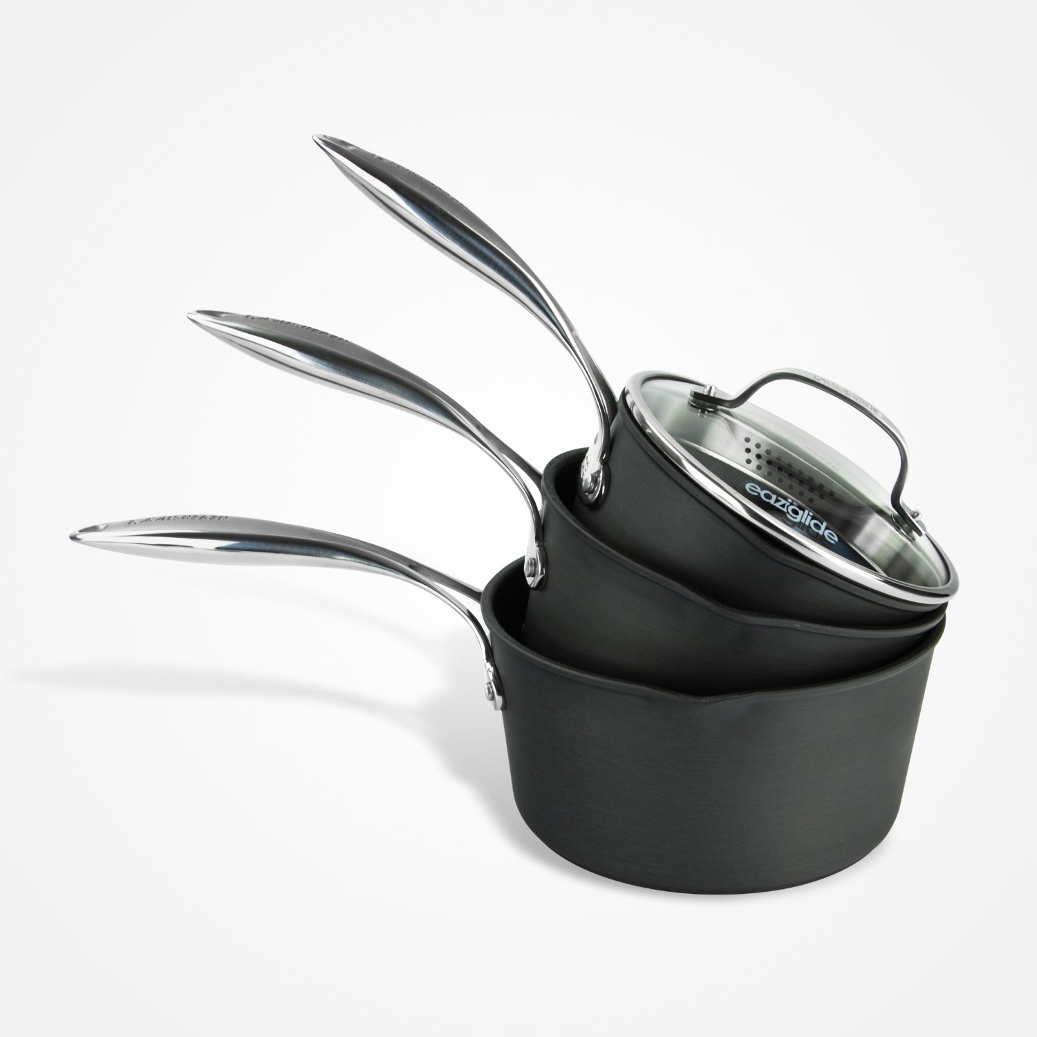 Eaziglide Neverstick3 3 Piece Saucepan Set with glass lids, featuring stacked non-stick saucepans and stainless steel handles.