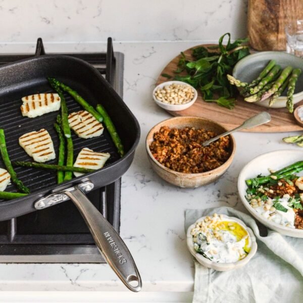 Eaziglide Neverstick3 28cm Non-Stick Grill Pan with ridged surface for searing and grilling, suitable for hob and oven cooking with an ergonomic handle.